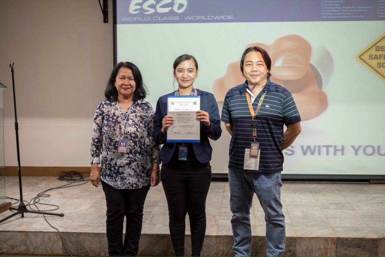 Cyril Cerio, Esco Biosafety Institute Ambassador, receiving the Certificate of Appreciation