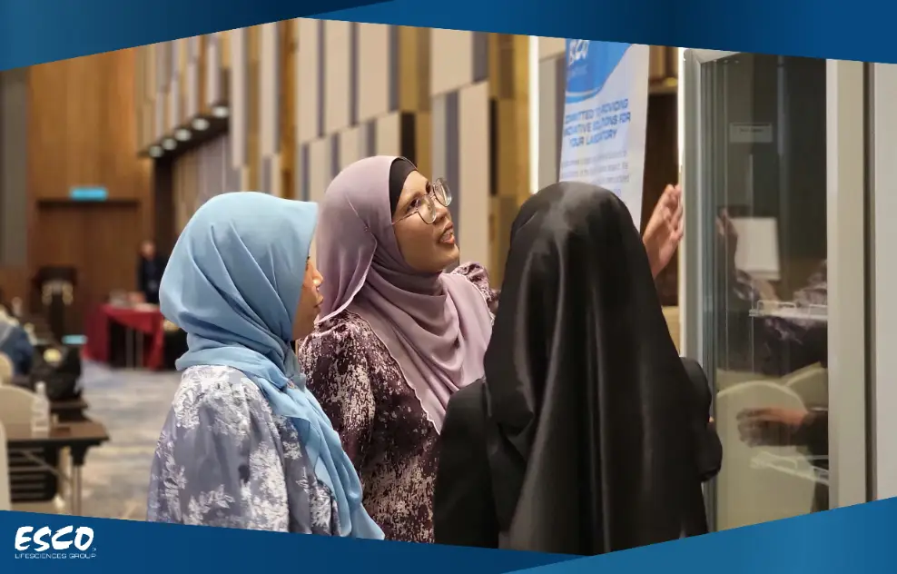 Three women are checking the Esco product