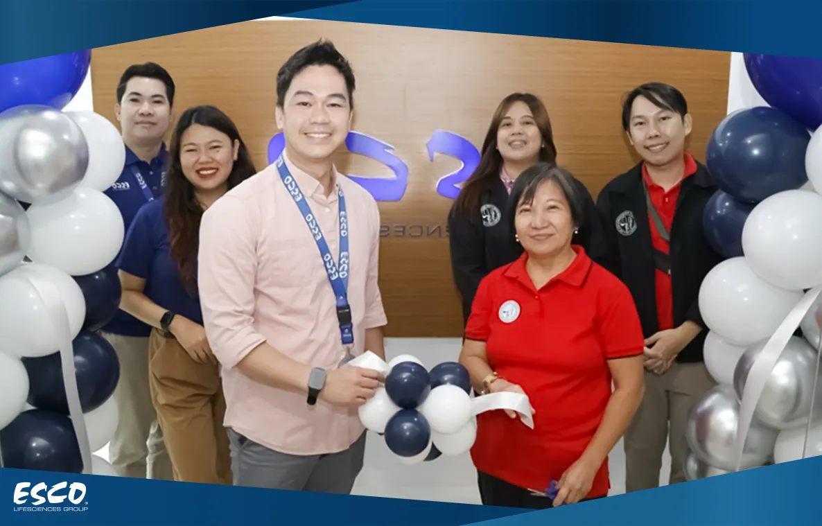 Dr. Ursela Bigol, President of the Philippine Society for Microbiology (left), and Ninoy Cahayon, Country Manager of Esco Philippines (right), at the ribbon-cutting ceremony for the opening of Esco Philippines’ new office.